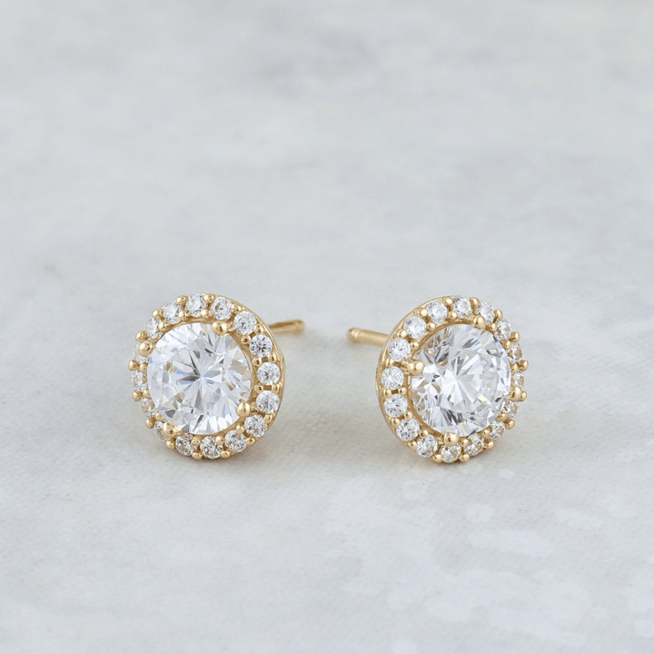 - Boucles d'oreilles Boucles d'oreilles Éclat en or 10K