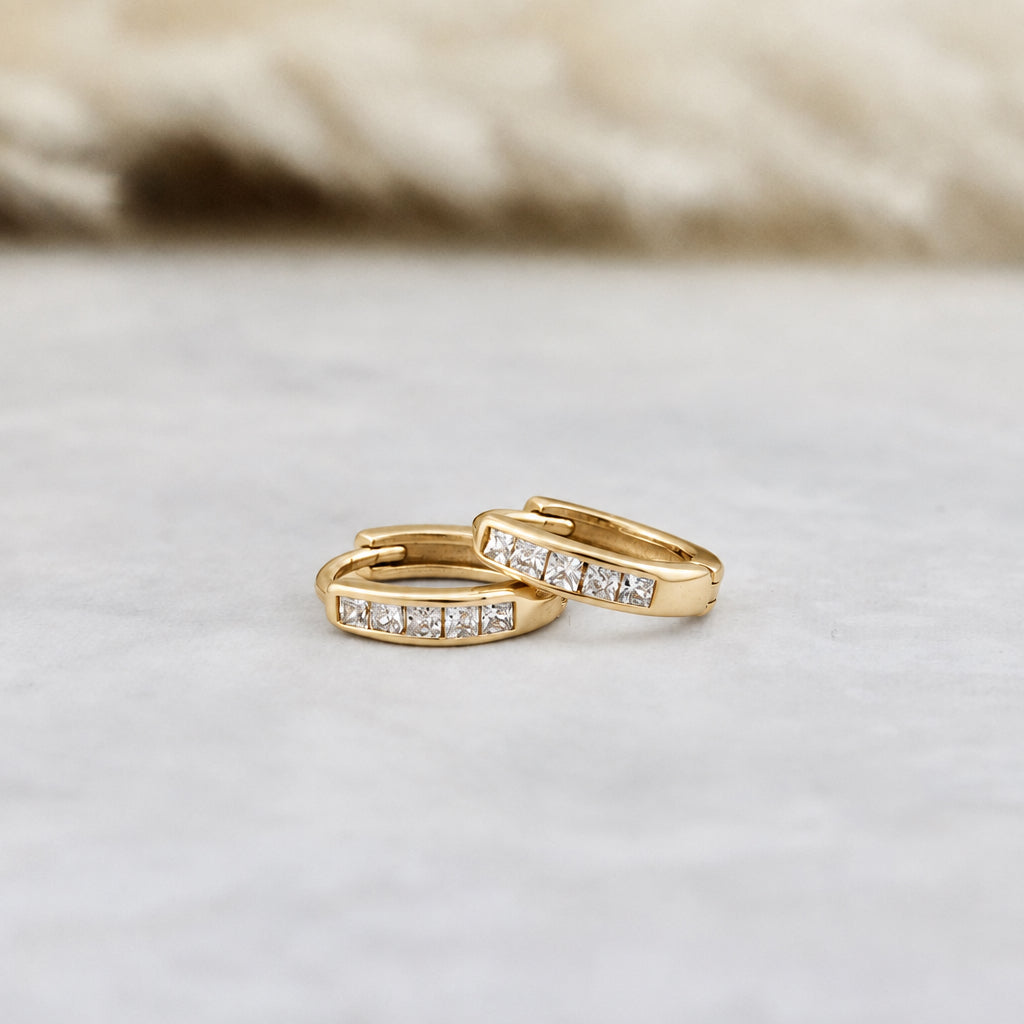 Sterling silver Princess Huggie earrings