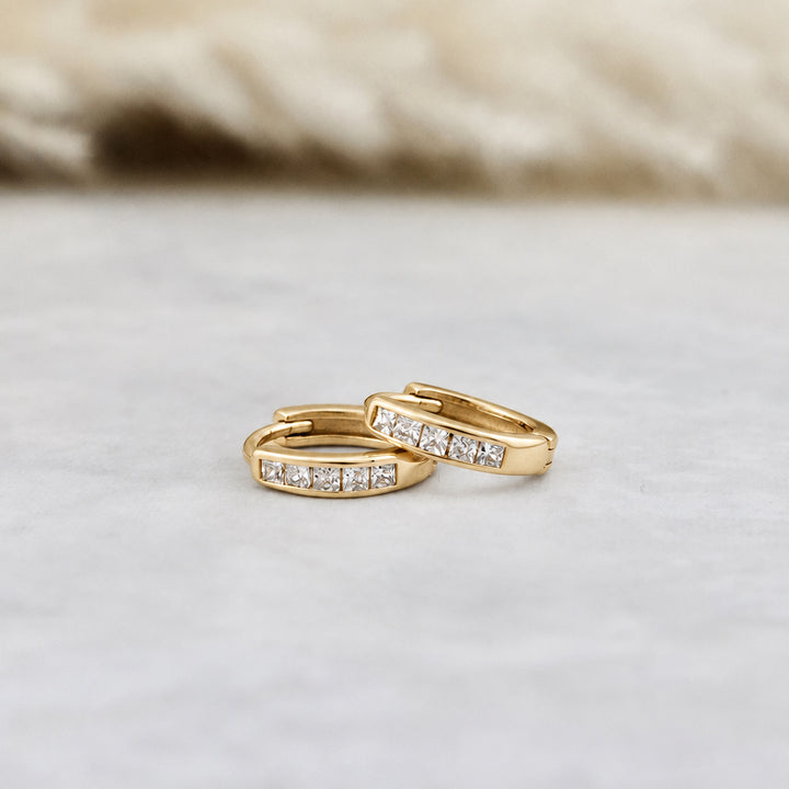 Sterling silver Princess Huggie earrings
