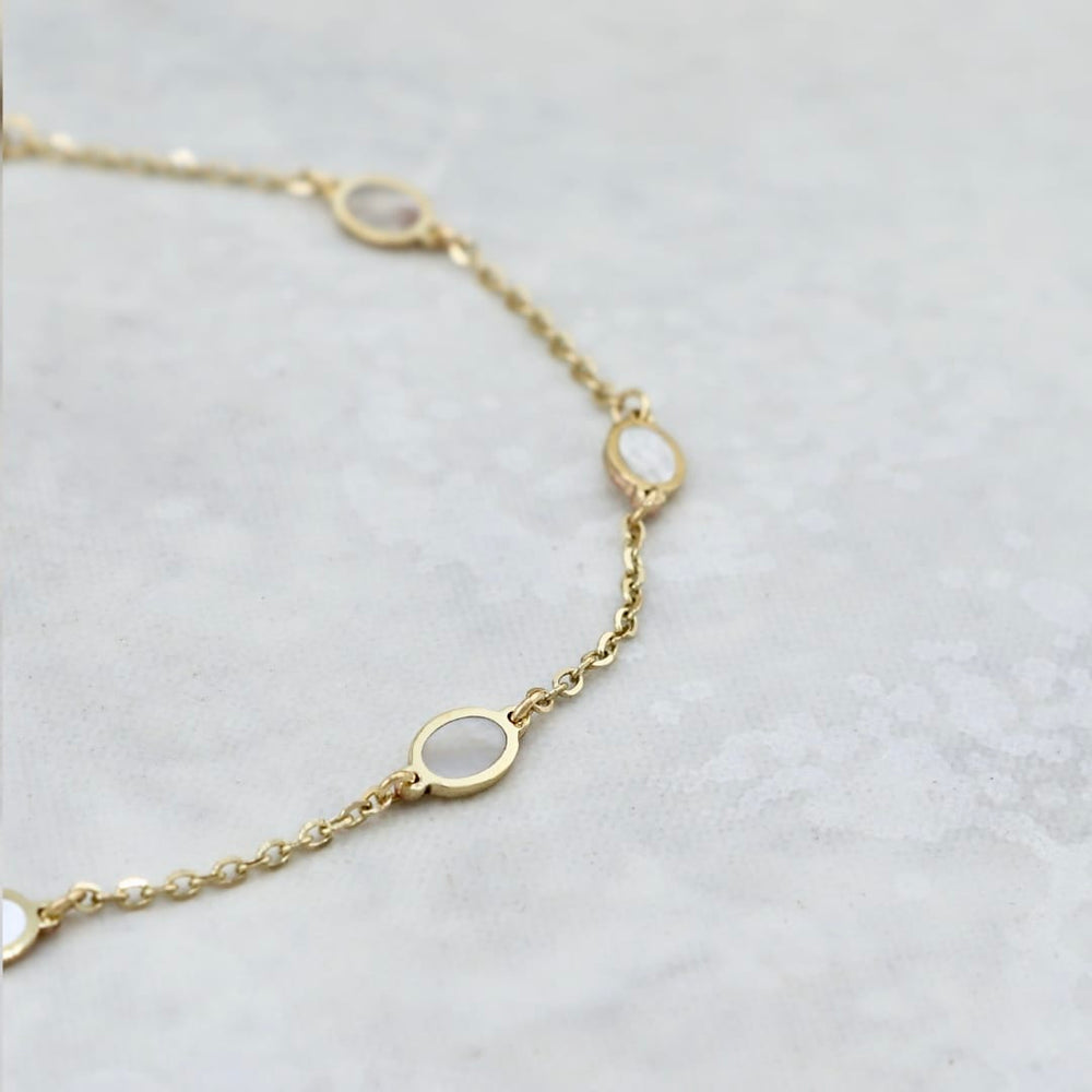 Bracelet Ovale nacré en or jaune 10K - 6.5 - 7 pouces / Or jaune 10K BY-H4-1111 Bracelet minimaliste Oval nacré en or 10K | Mathieu Blanchard Mathieu Blanchard Joaillerie