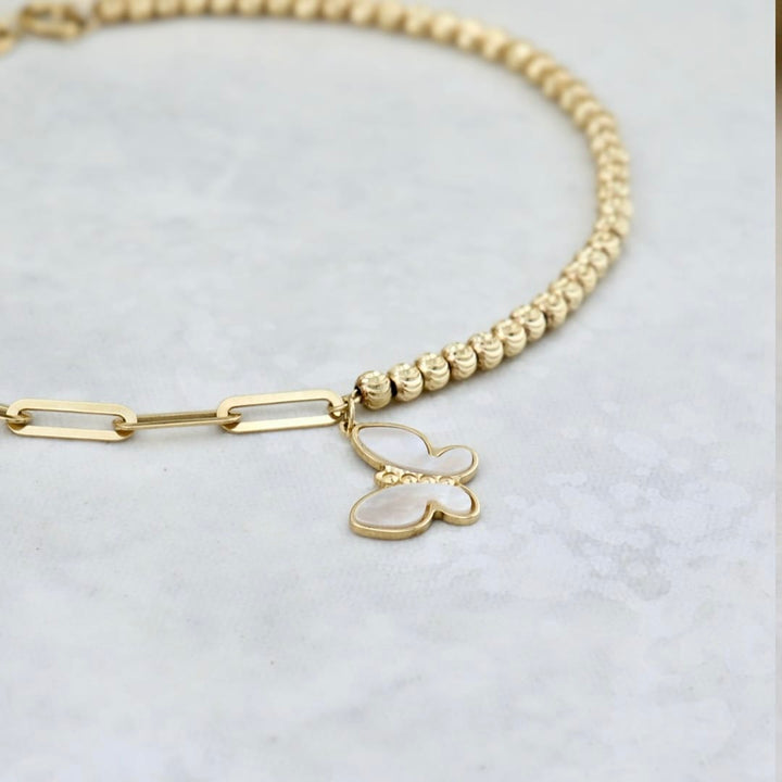 Bracelet Papillon en or jaune 10K Mathieu Blanchard Joaillerie Or jaune 10K AR60-35 Bracelet Papillon en nacre de perle en or 10K | Mathieu Blanchard Mathieu Blanchard Joaillerie