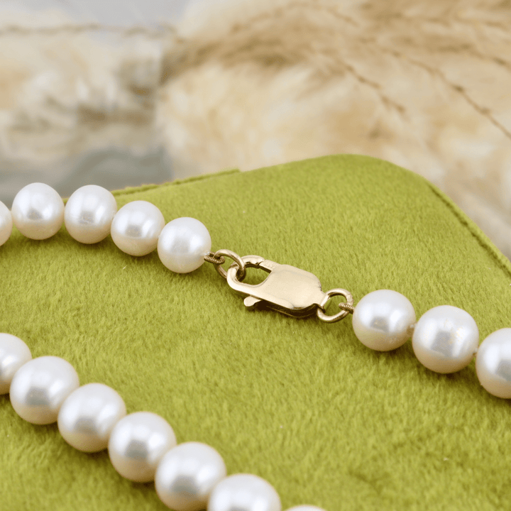 Collier de perles 8 mm et en or jaune 14K Mathieu Blanchard Or jaune 14K PCOM16880S Bracelet Perles  6mm - AAA  et or 14K | Mathieu Blanchard Mathieu Blanchard Joaillerie
