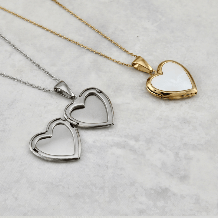 Collier porte photos Cœur en acier inoxydable Mathieu Blanchard Pendants Collier porte-photos Coeur en nacre de perle en acier inox Mathieu Blanchard Joaillerie