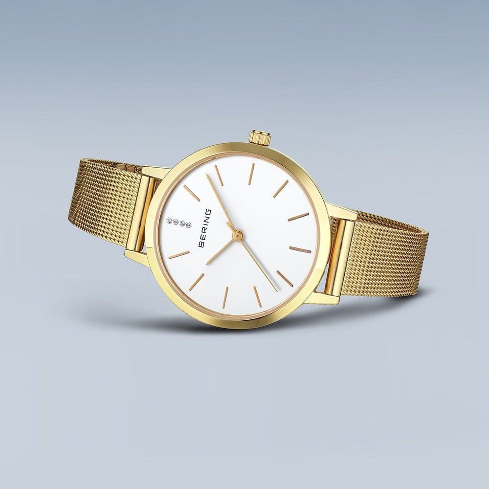 Ensemble cadeau Montre Bering Classic34mm 13434 334 GWP Bering Montre Acier inoxydable plaqué or jaune 13434-334-GWP Ensemble cadeau Montre Bering Classic Or 34mm 13434-334-GWP - Mathieu Blanchard - Dépositaire officiel Bering Canada Mathieu Blanchard Joaillerie