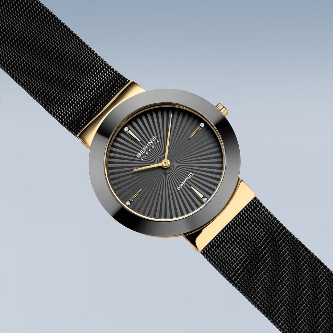 Montre Bering Ceramique 35mm 11435 132 Bering Montre Acier inoxydable plaqué or jaune et noir 11435-132 Montre Bering Ceramique Noire 35mm 11435-132 | Mathieu Blanchard Mathieu Blanchard Joaillerie