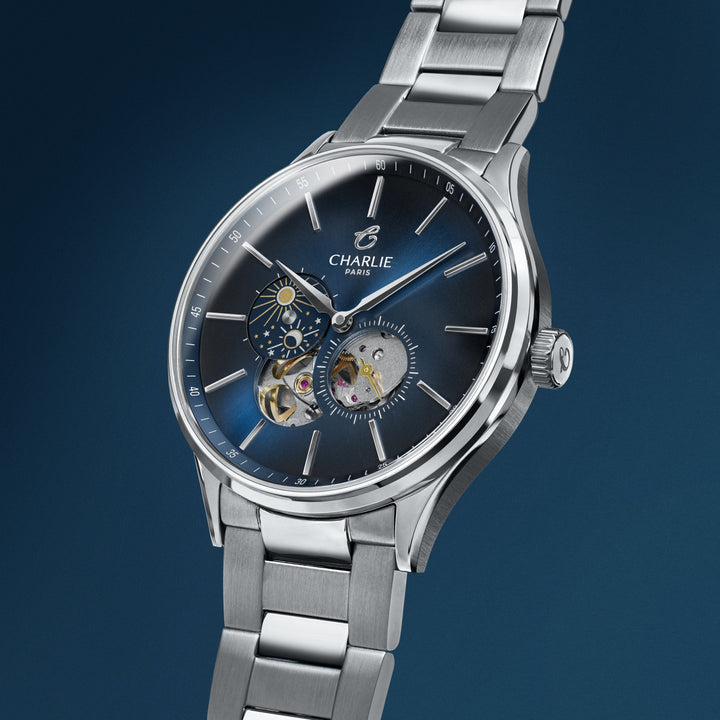 Montre Charlie Paris INITIAL Open Heart Jour/Nuit Bleu 40 mm en acier inoxydable Charlie Paris Montre Montre Charlie Paris INITIAL Open Heart Jour/Nuit - Bleu 40 mm | Dépositaire Officiel Canada | Mathieu Blanchard Joaillerie Mathieu Blanchard Joaillerie