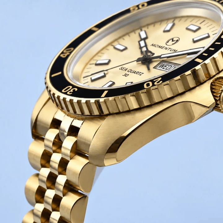 Montre Momentum Champagne Sea Quartz 30 - 42mm Momentum Montre Acier inoxydable plaqué or jaune 081AADBFC-EL-B-BK-B-BK-AGK-BH-AG-B-K10 Montre Champagne Sea Quartz 30 - 42mm - Dépositaire officiel Momentum Canada Mathieu Blanchard Joaillerie