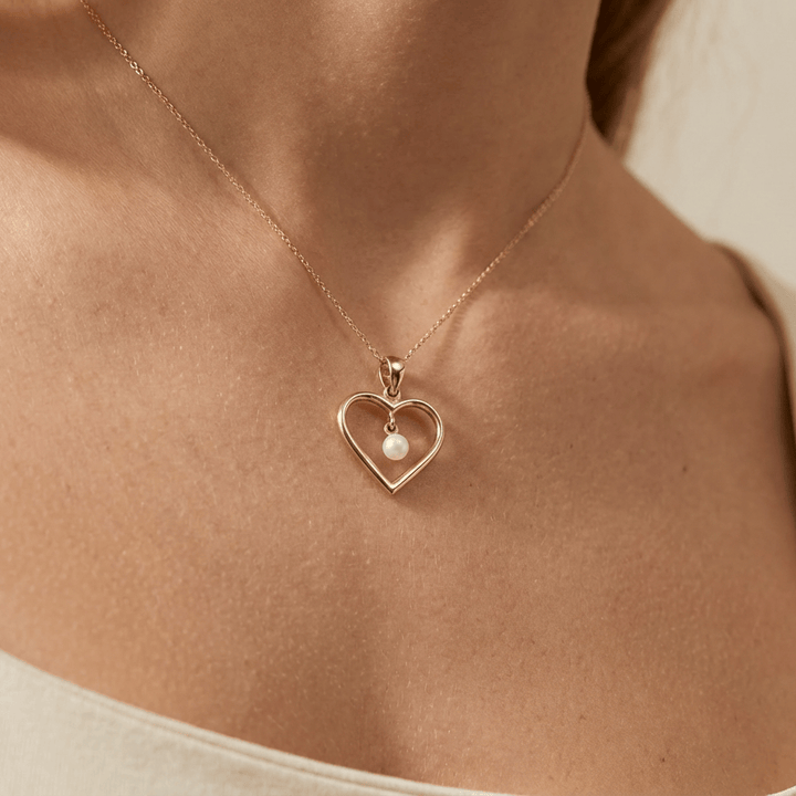 - Colliers Pendentif Coeur et Perle en or 10K