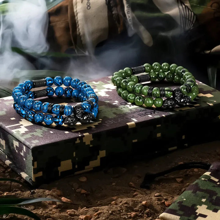 Quatuor de bracelets Strike en acier inoxydable SkeletonHD Bracelets Acier inoxydable Lot de 4 bracelets Strike Box - Camouflage, par SkeletonHD | Mathieu Blanchard Mathieu Blanchard Joaillerie