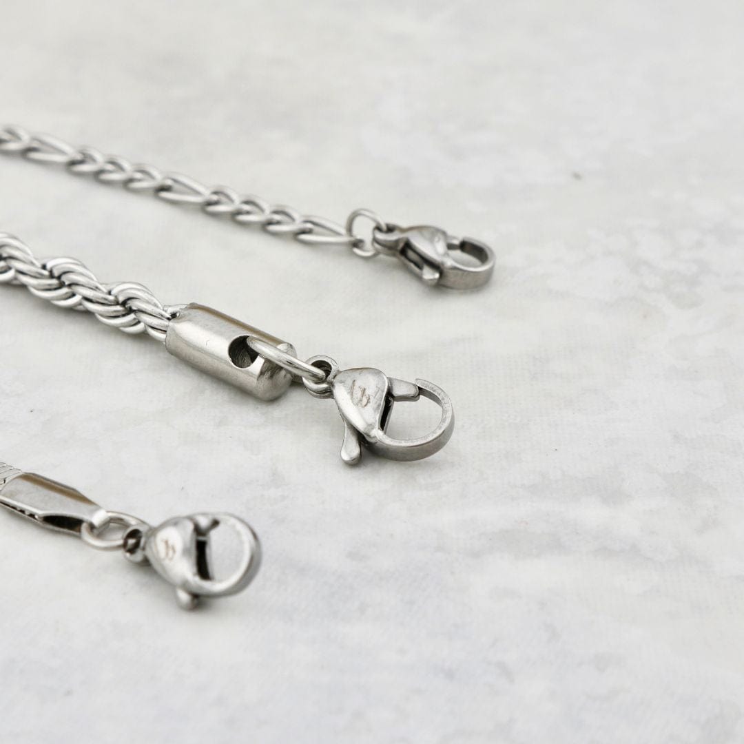 Trio de bracelets La Force en acier inoxydable Mathieu Blanchard Bracelets Acier inoxydable PTRM13022S Trio de bracelets Torsade - Figaro en acier inoxydable - unisexe Mathieu Blanchard Joaillerie